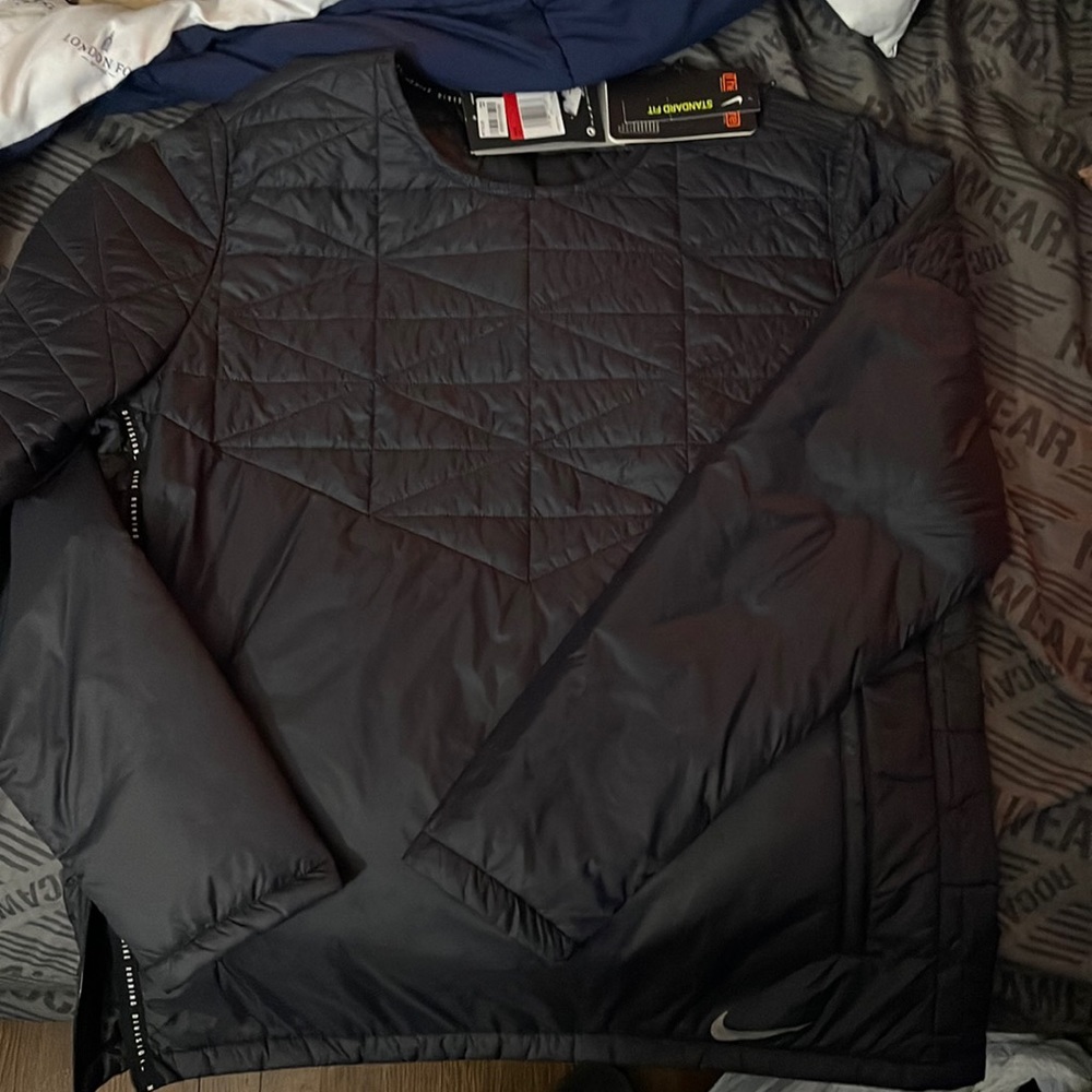 Nike. Size Men Large. Nike Thermore standard fit.